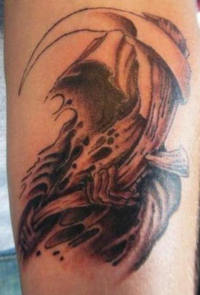 Grim reaper arm tattoo